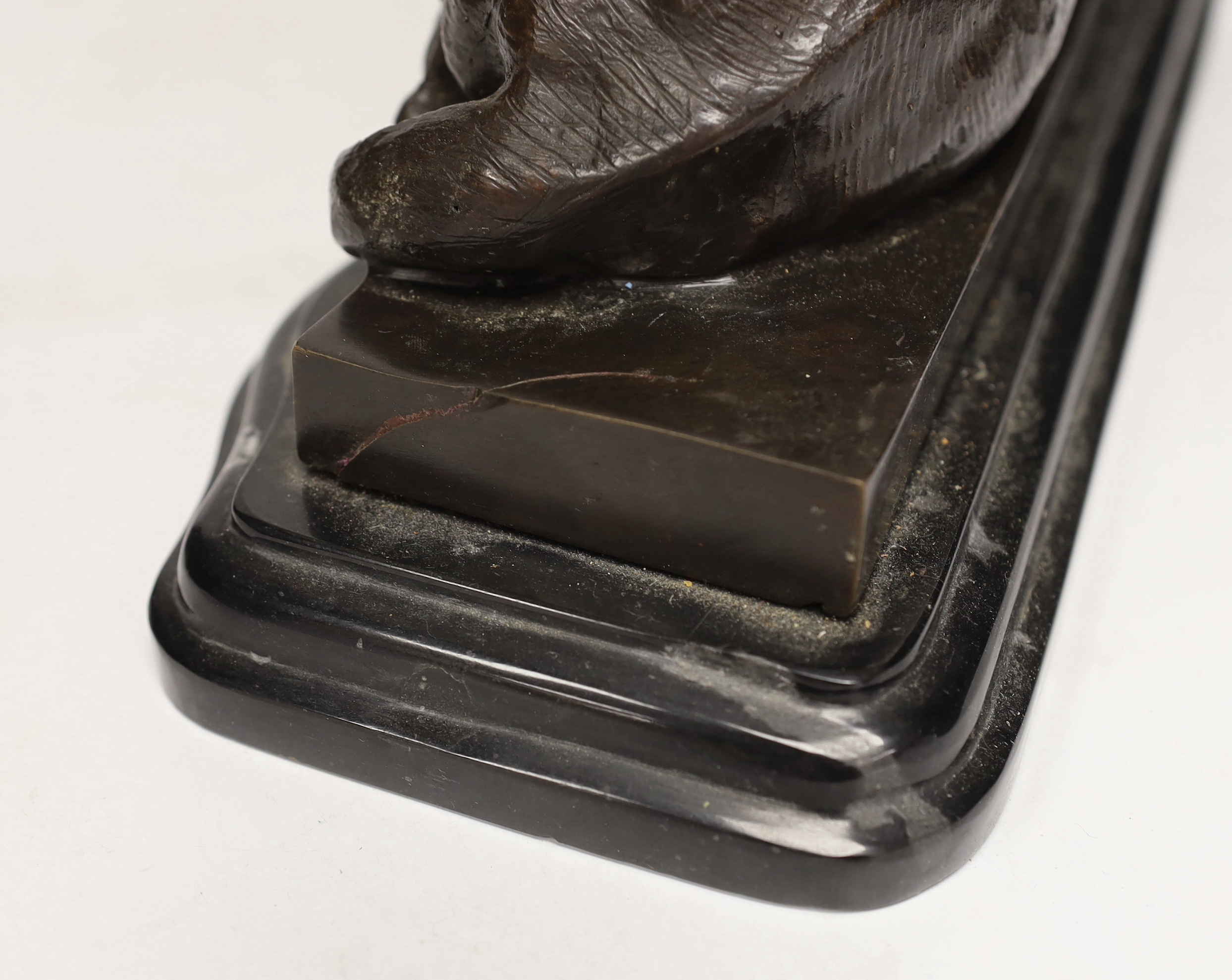 After Isadore Bonheur, a bronze figure of a recumbent lion, raised on marble base, 35cm wide